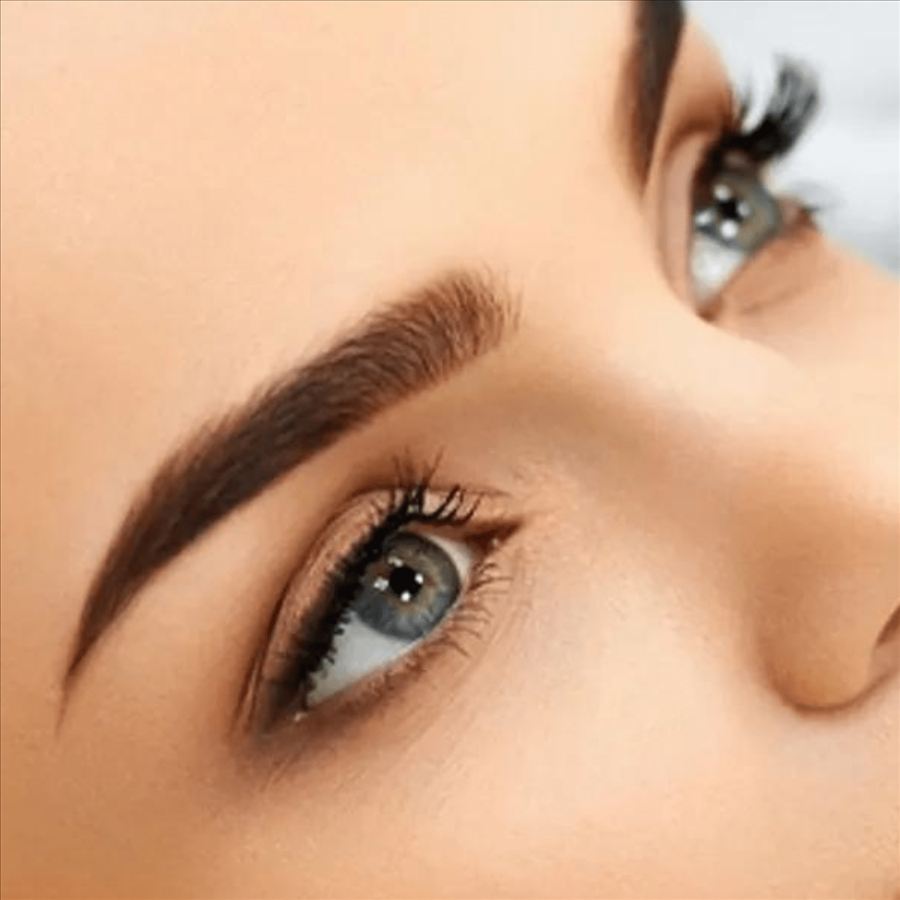 Close-up of full, shaped eyebrows